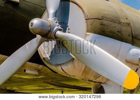 Radial Engine Propeller And Engine Cowling On Military Aircraft On Display In Public Park.
