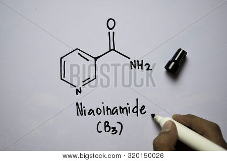 Niaoinamide (b3) Molecule Written On The White Board. Structural Chemical Formula. Education Concept