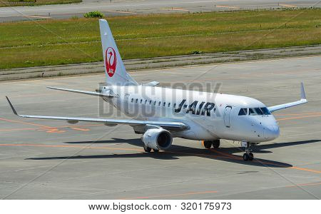 Sapporo, Japan - Jul 3, 2019. Ja221j J-air Embraer Erj-170std Taxiing On Runway Of New Chitose Airpo