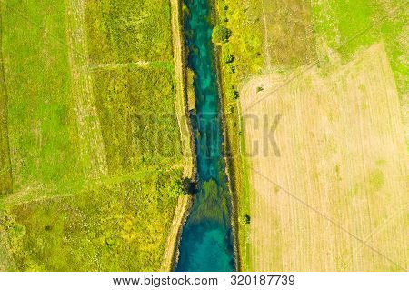 Beautiful Gacka River Flowing, Field Aerial Summer View, Lika Region Of Croatia