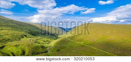Aerial View Of The Glenveagh National Park With Castle Castle And Loch In The Background - County Do