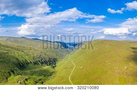Aerial View Of The Glenveagh National Park With Castle Castle And Loch In The Background - County Do