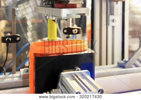 Cutting The Top Of The Plastic Jar. The Formation Of The Product