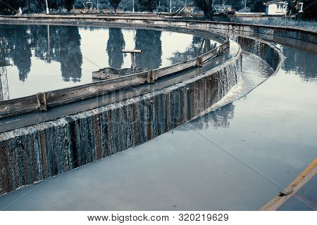Sedimentation Round Tank In Modern Sewage Or Wastewater Treatment Plant, Blue Toned.