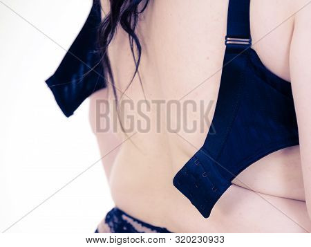 Fat Woman Rear View Opening Taking Off Or Putting On Her Bra. Plus Size Overweight Female Model Wear
