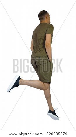 Back view of man in zero gravity or a fall. guy is flying, falling or floating in the air. Side view people collection. side view of person. Isolated over white. A guy in sneakers jumps a puddle.
