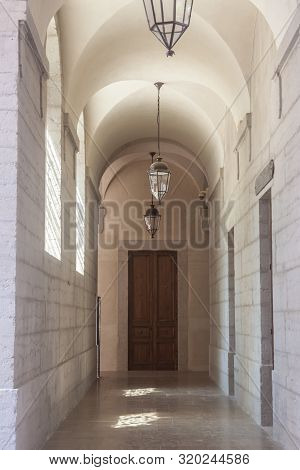 Arches And Lobby Of The Cloister In A Medieval Monastery In Lyon, France, With Its Typical Stone And