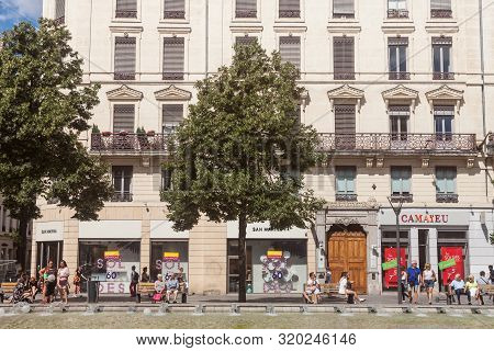 Lyon, France - July 13, 2019: Pedestrians Walking On Rue De La Republique Street In Lyon, France, Fa