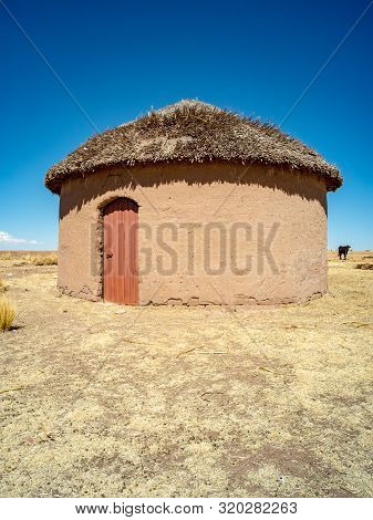 Rustic Traditional Uru House Made Of 
Adobes In The Bolivian Altiplano