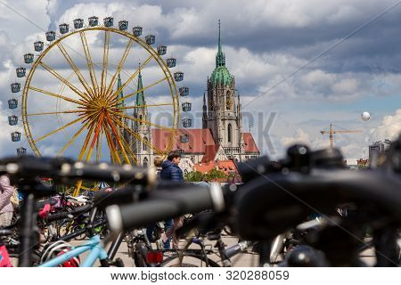 Theresienwiese, Munich, Germany, 2019 April 27: St Paul Church With Ferris Wheel In The Background F