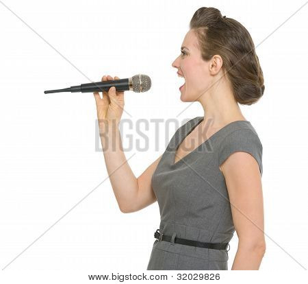 Woman Singing In Microphone Isolated