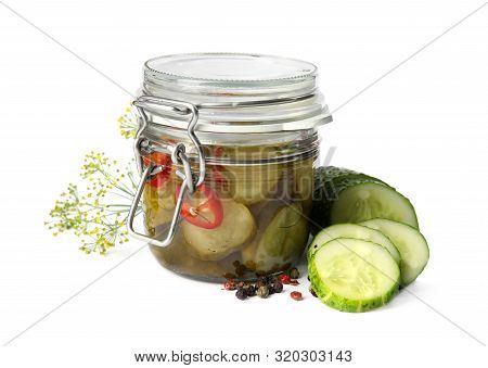 Jar With Pickled Cucumbers On White Background