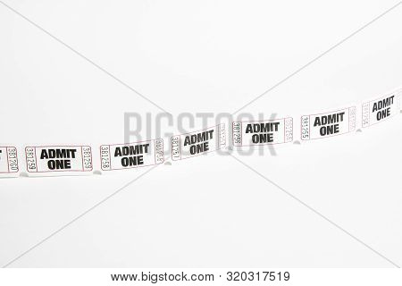A Macro Or Close-up Shot Of A Strip Of Generic White Sequentially Numbered Admittance Paper Ticket.