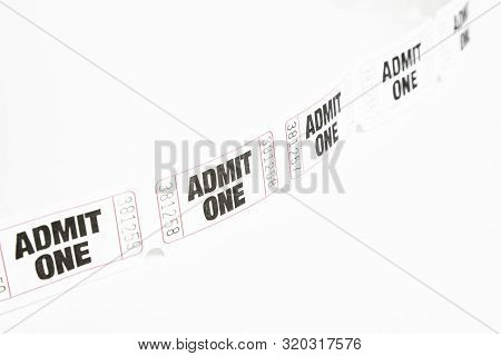 A Macro Or Close-up Shot Of A Strip Of Generic White Sequentially Numbered Admittance Paper Ticket.