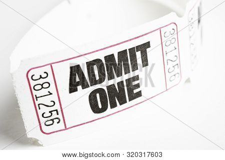 A Macro Or Close-up Shot Of A Strip Of Generic White Sequentially Numbered Admittance Paper Ticket.