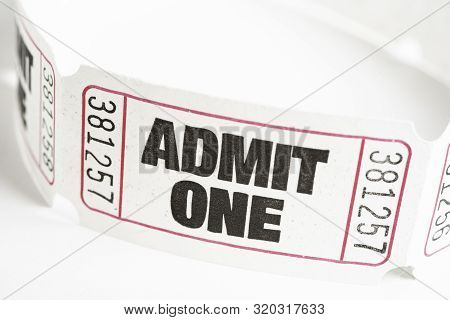 A Macro Or Close-up Shot Of A Strip Of Generic White Sequentially Numbered Admittance Paper Ticket.