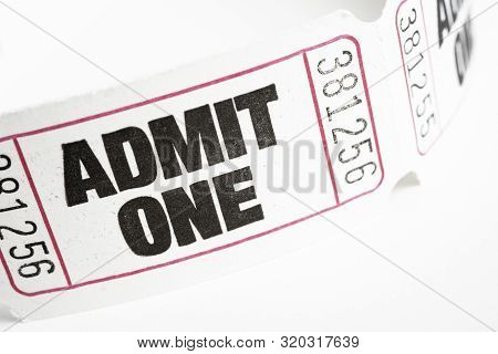 A Macro Or Close-up Shot Of A Strip Of Generic White Sequentially Numbered Admittance Paper Ticket.