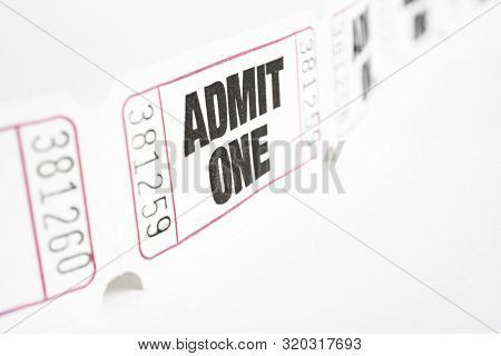 A Macro Or Close-up Shot Of A Strip Of Generic White Sequentially Numbered Admittance Paper Ticket.