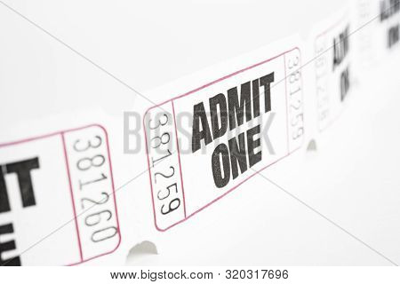 A Macro Or Close-up Shot Of A Strip Of Generic White Sequentially Numbered Admittance Paper Ticket.