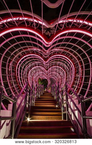 A Stairway Leading Through A Tunnel Of Hearts In Jewangsan Park In Chinhae, South Korea