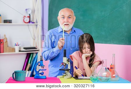 Expand Your Mind. Chemistry And Biology. Teacher Help Schoolgirl. School Lesson. Good Pedagogue Frie