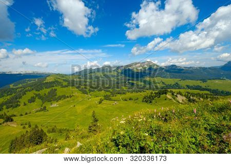 Summer time mountain panoramic landscape in Switzerland near Habkern village