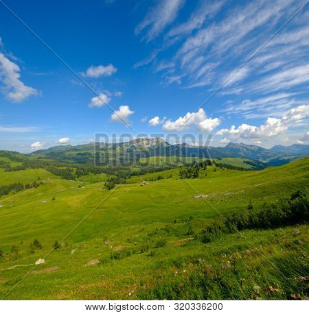 Summer time mountain panoramic landscape in Switzerland near Habkern village