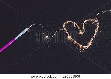 Paintbrush Painting With Light With A Set Of String Led Lights