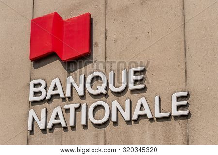 Montreal, Canada - 03 September 2019: Banque Nationale Sign On The Facade Of Tour De La Place Dupuis