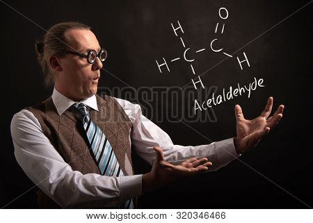 Professor Presenting Handdrawn Chemical Formula Of Acetic Acid Ch3cooh Molecule