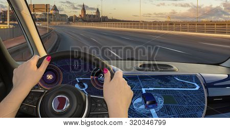 Woman Driving A Car Equipped With Active Safety Systems