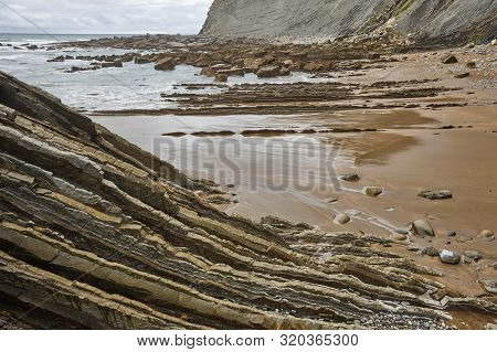 Flysch Dramatic Rock Formation Cantabric Sea In Zumaia, Euskadi. Spain