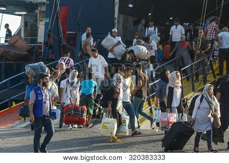Refugees And Migrants Disembark To The Port Of Thessaloniki After Being Transfered From The Refugee