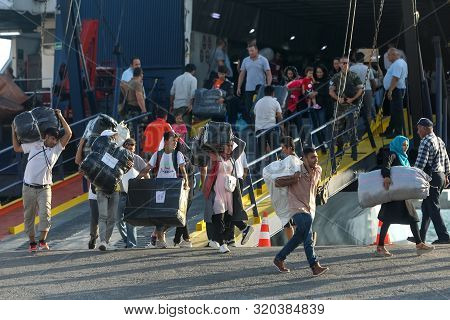 Refugees And Migrants Disembark To The Port Of Thessaloniki After Being Transfered From The Refugee