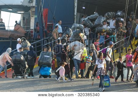 Refugees And Migrants Disembark To The Port Of Thessaloniki After Being Transfered From The Refugee