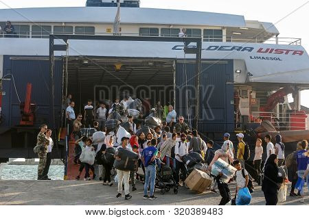Refugees And Migrants Disembark To The Port Of Thessaloniki After Being Transfered From The Refugee