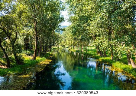 Beautiful River Gacka, River Surface Between The Trees, Lika Region Of Croatia