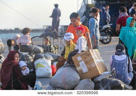Refugees And Migrants Disembark To The Port Of Thessaloniki After Being Transfered From The Refugee
