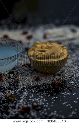 Ubtan/face Mask/face Pack Of Multani Mitti Or Fuller's Earth On Wooden Surface In A Glass Bowl Consi