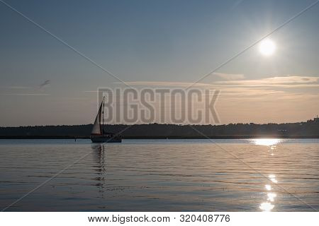 Sunset On The River Coast, Beautiful View Sunset, Evening At The Riverscape.