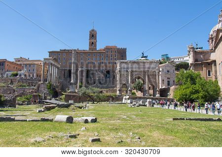 Italy, Rome - April 17 2017: The View Of Tabularium, The Arch Of Septimius Severus And The Column Of