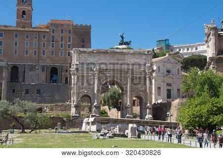 Italy, Rome - April 17 2017: The View Of The Arch Of Septimius Severus At The Northwest End Of The R