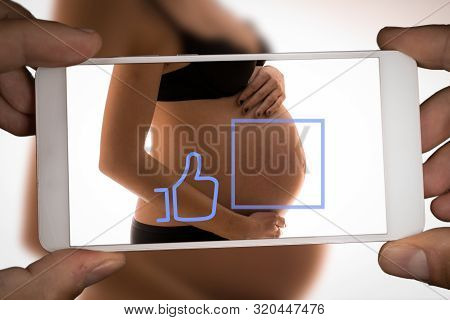 Sharenting Concept, Taking A Photo Of A Womans Pregnant Belly