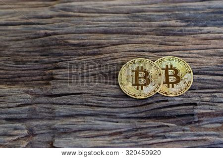 Digital Currency Physical Metal Bitcoin Coin On The Old Wooden Table