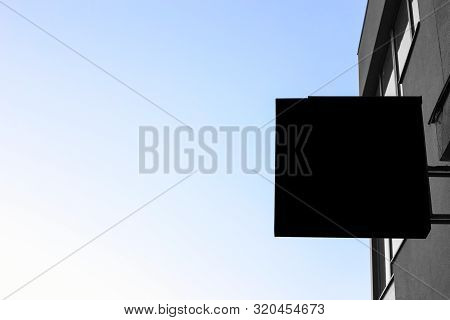 Empty Side Sign Near A Store, Bar, Cafe, Restaurant. Mockup. Copy Space For Text