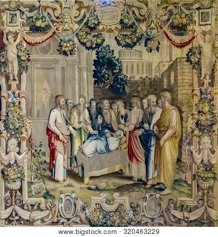 Como, Italy - April 16, 2019: Detail Of The Tapestry From Como Cathedral In Italy. Como Cathedral Is