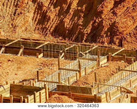 Fragment Of The Foundation In A Deep Sandy Pit. Construction.