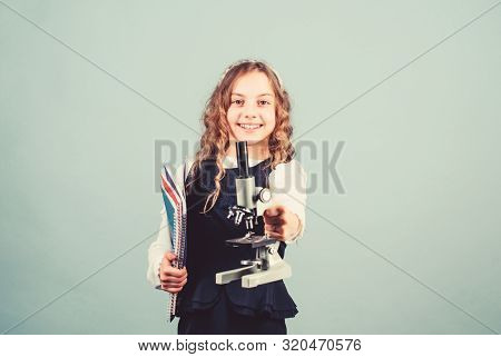 Science Research In Lab. Small Genius Girl With Microscope. Small Girl Scientist Testing. Child Stud