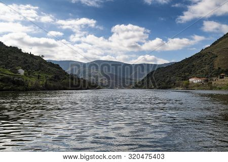 Scenic View Of The Douro River And Valley With Terraced Vineyards Near The Pinhao Village, In Portug