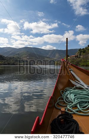 Scenic View Of The Douro River And The Douro Valley From A Rabelo Boat, In Portugal; Concept For Tra